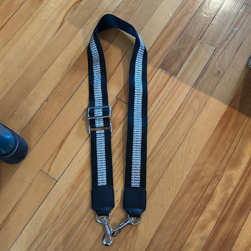 NWT purse strap. Adjustable. Black and silver.